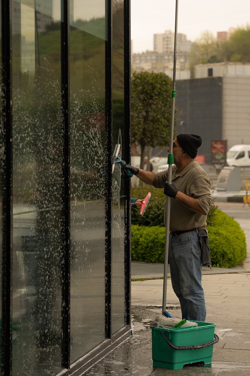 Window cleaner on the job — real work photos for a window cleaner website